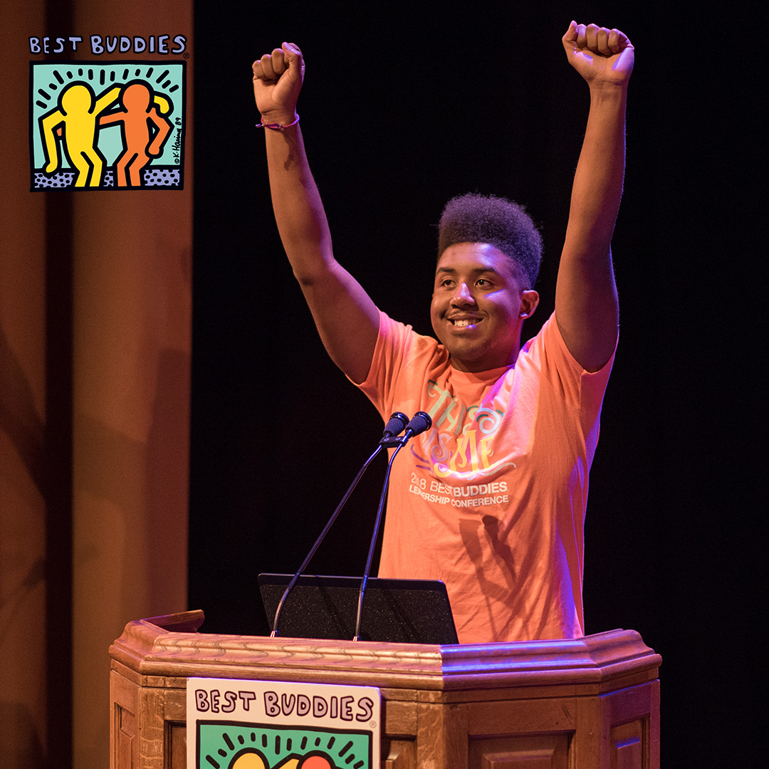 bbi-social-media-16 Buddy Ambassador Joshua Felder at a podium with his hands raised